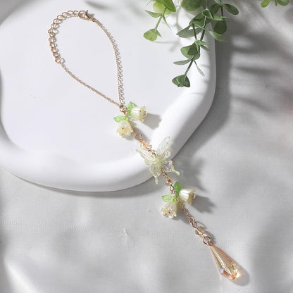 Butterfly Flower Car Rearview Mirror Charm Yellow Lily of Valley | Crystal Rhinestone Design. Features Floral Design. Built-In Mirror. Perfect Car Interior Decoration