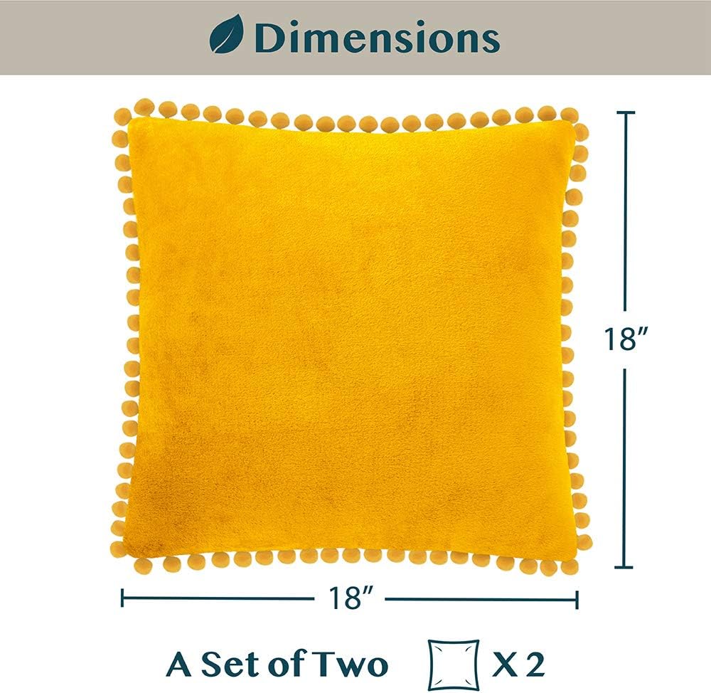 PAVILIA Mustard Yellow Throw Pillow Covers with Pom Pom 18x18 Set of 2, Decorative Pillow Cases for Bedroom Aesthetic, Small Throw Pillows Set for Bed, Velvet Euro Plush Cushion Covers for Sofa Couch