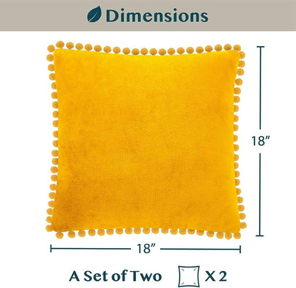 PAVILIA Mustard Yellow Throw Pillow Covers with Pom Pom 18x18 Set of 2, Decorative Pillow Cases for Bedroom Aesthetic, Small Throw Pillows Set for Bed, Velvet Euro Plush Cushion Covers for Sofa Couch