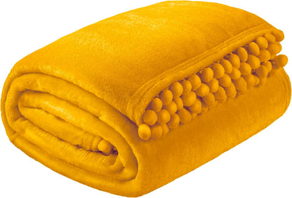 PAVILIA Fleece Throw Blanket for Couch with Pom Pom Fringe, Mustard Yellow, Soft Cozy Fuzzy Flannel Blanket for Sofa Bed, Lightweight Plush All Season Throw, 50x60 Inches