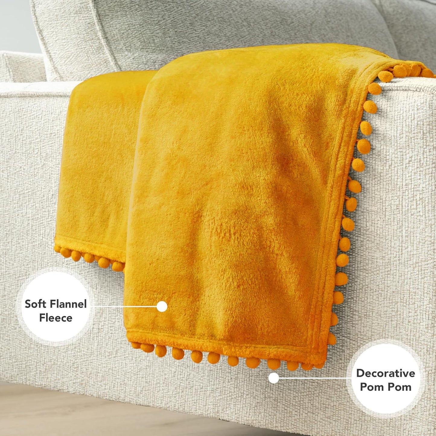 PAVILIA Fleece Throw Blanket for Couch with Pom Pom Fringe, Mustard Yellow, Soft Cozy Fuzzy Flannel Blanket for Sofa Bed, Lightweight Plush All Season Throw, 50x60 Inches