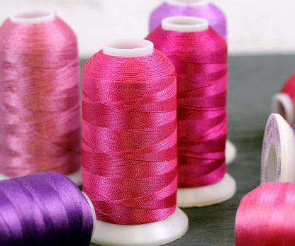 Polyester Machine Embroidery Thread, 1000M 40wt, Pale Yellow 151 | 40wt trilobal polyester embroidery thread with bright sheen. Works with home and commercial embroidery and sewing machines.