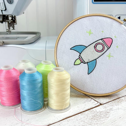 Glow in the Dark Embroidery Thread, 1000M, Yellow | Glow in the dark embroidery thread adds luminous detail to designs. Works with embroidery and sewing machines.