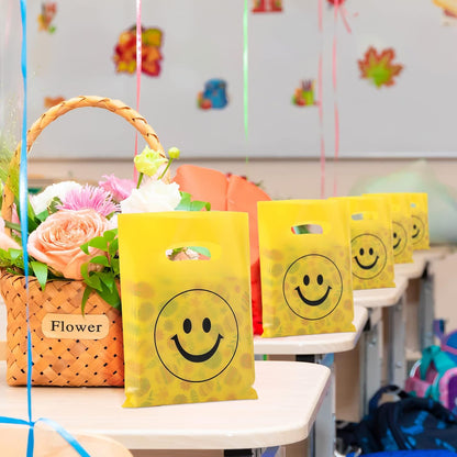 300 Pieces Smile Face Gift Bags 6" x 8" Plastic Party Favors Goodie Treat Bags Bulk with Handle for Kids Birthday Party Classroom School Supplies(Yellow)