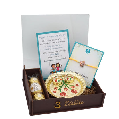 Rakhi Gift Box | Devine Rakhi Hamper with Delightfuly Cute Ganeshji Rakhi Bracelet, Roli, Chawal, Mini Thali Set, A Chocolate, And A Greeting Card (Yellow Ganeshji Gift Box)