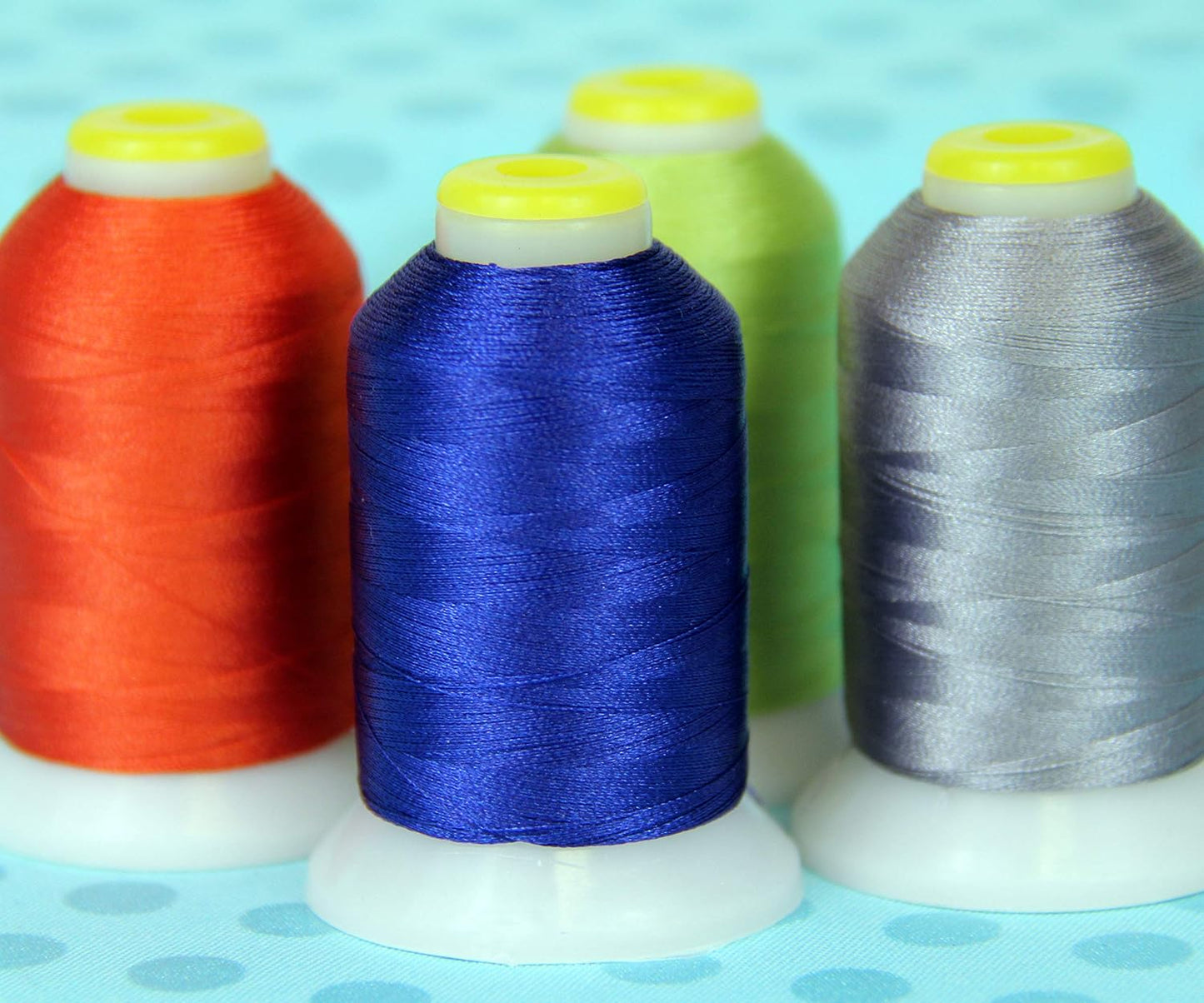 60wt Embroidery Bobbin Thread, 1000M, Yellow | Lightweight bobbin thread for machine embroidery and sewing. Smooth 60wt thread helps designs stitch cleanly.
