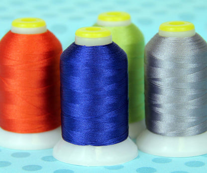 60wt Embroidery Bobbin Thread, 1000M, Yellow | Lightweight bobbin thread for machine embroidery and sewing. Smooth 60wt thread helps designs stitch cleanly.
