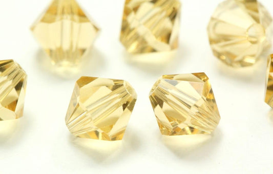 100pcs Adabele Austrian 4mm (0.16 Inch) Faceted Bicone Crystal Beads Golden Yellow Champagne Compatible with Swarovski Crystals 5301/5328