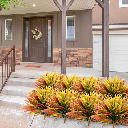 16 Pieces 17 in Artificial Tall Grass Plastic Fake Outdoors Plants Faux Bushes UV Resistant Greenery Shrubs for Home Garden Pathway Front Porch Decor (Yellow,Orange Red)